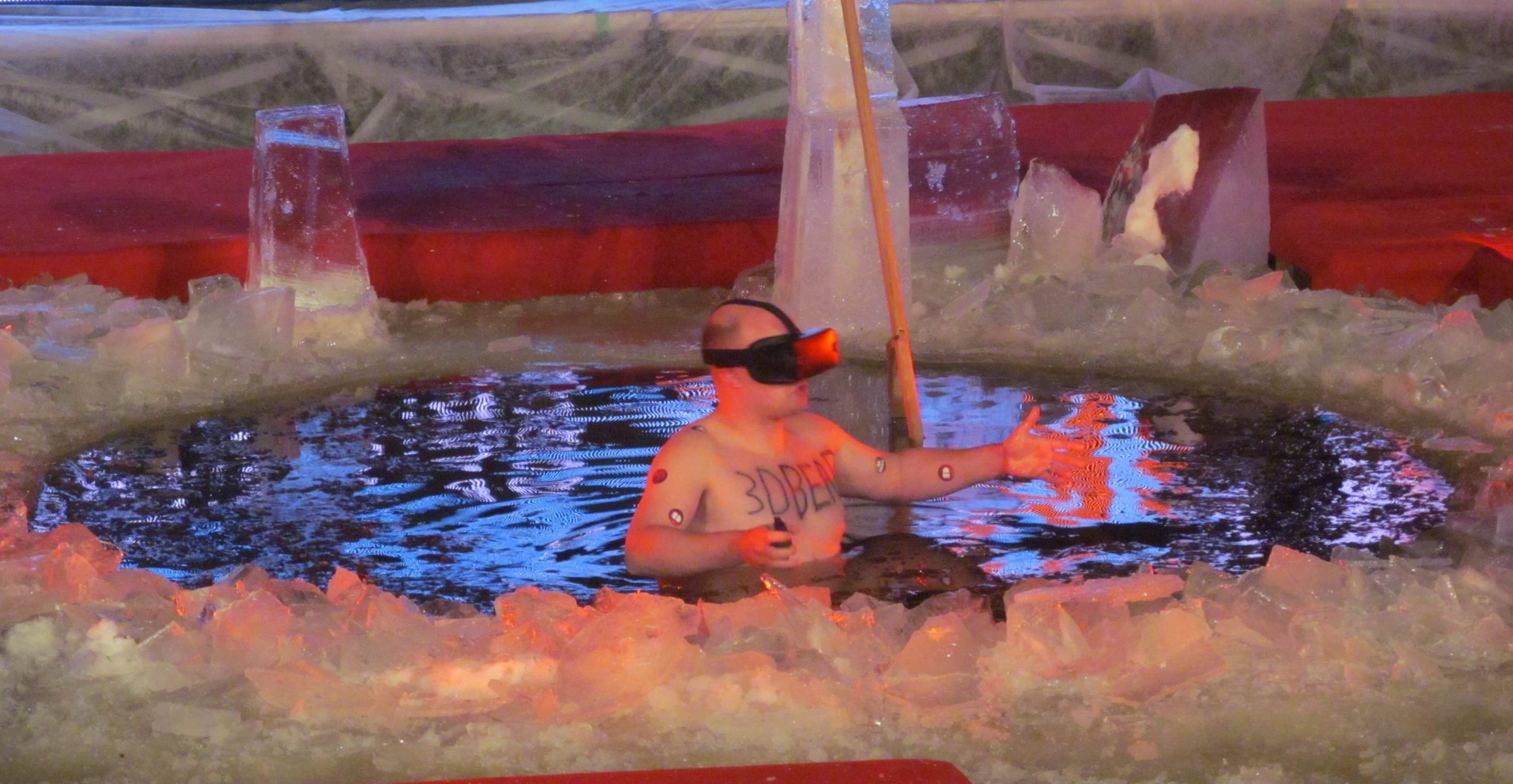 Taking an ice cold dip at Polar Bear Pitching in Oulu